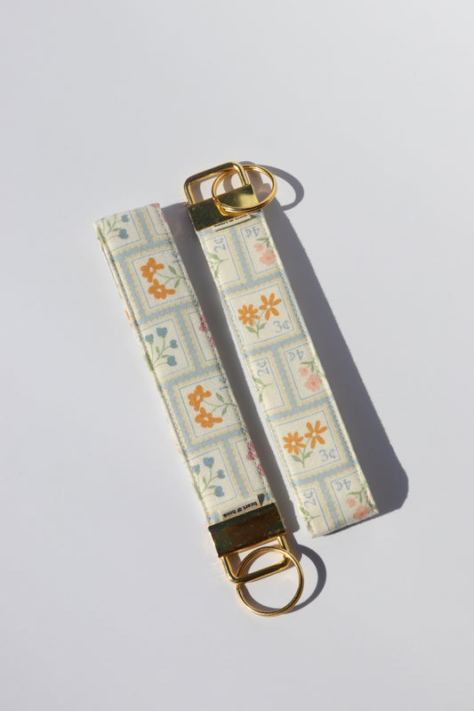Petal Postage Wristlet